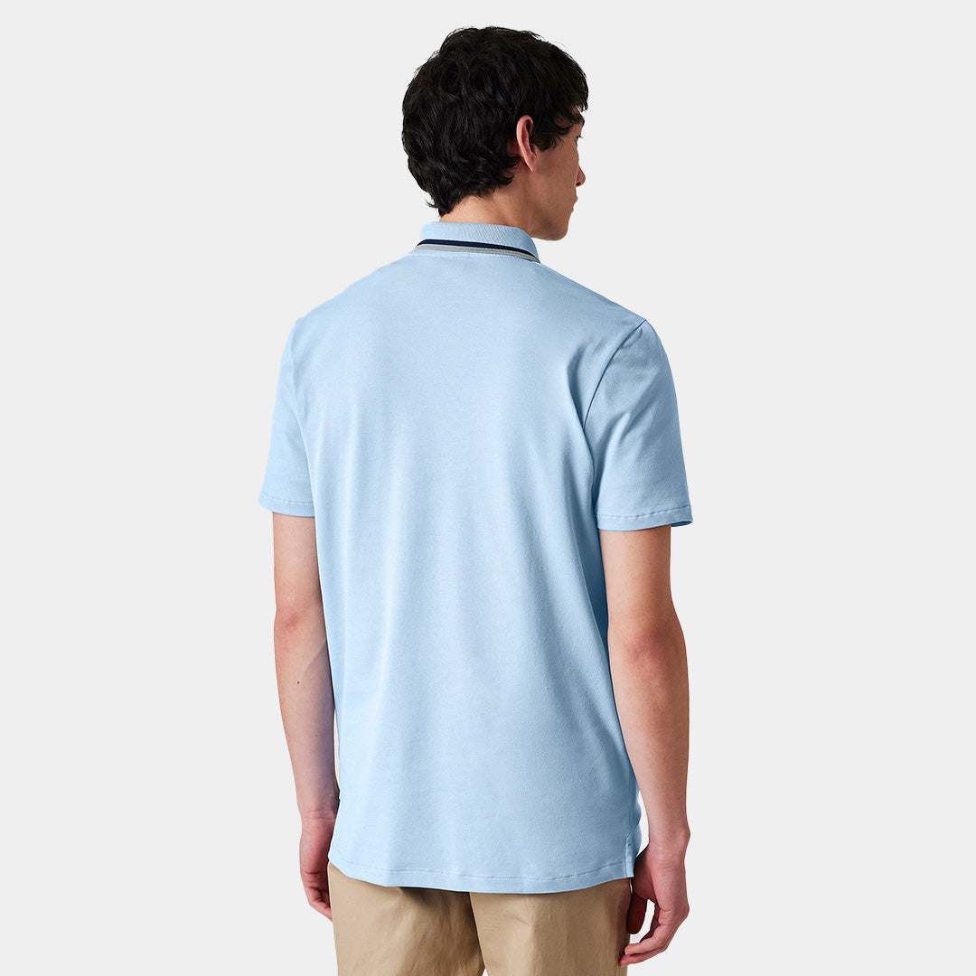 Polo azul claro de algodón orgánico con cuello con cremallera